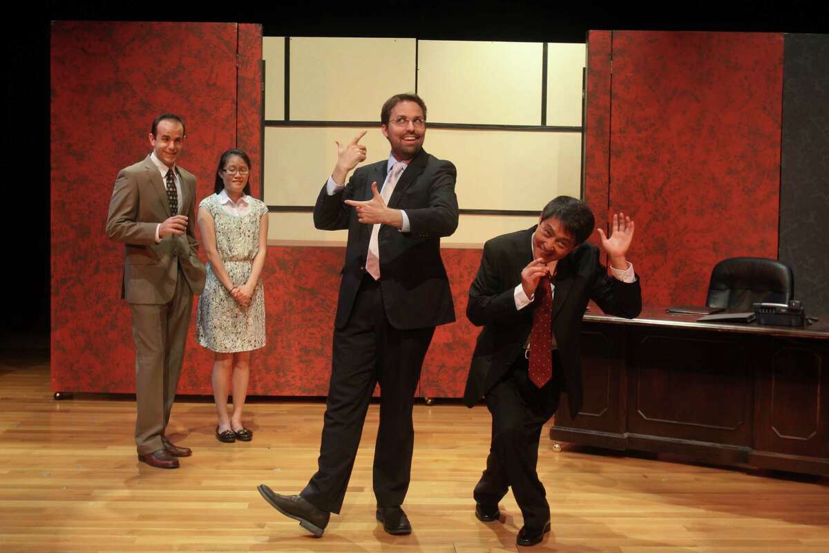 Mike Yager, from left, Janice Pai Martindale, John Dunn and Jian Xin star in the Black Lab Theatre and Asia Society Texas Center's Houston premiere of David Henry Hwang's 2011 Broadway play "Chinglish."