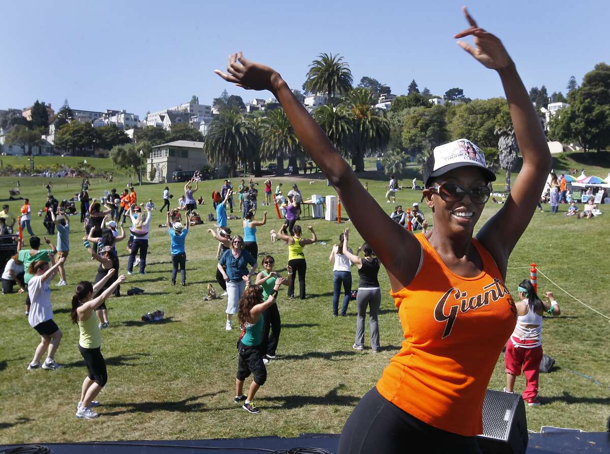 Eboniña Evans leads a Zumba-thon exercise dance session to kickoff the annual Cinco de Mayo celebration at Dolores Park in San Francisco, Calif. on Saturday, May 4, 2013.