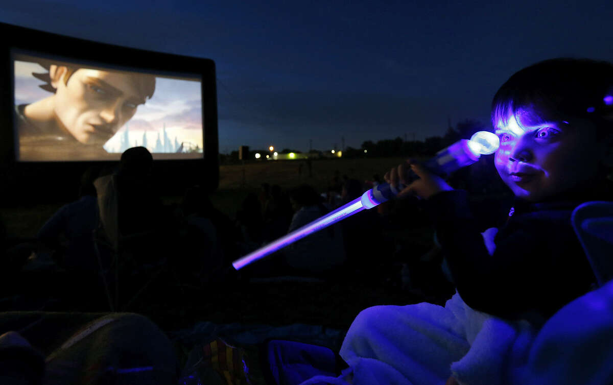 Aiden Tate, 3, was on hand for the showing of “Star Wars: The Clone Wars” after a ribbon-cutting for the new $2.3 million Mission Marquee Plaza at the former Mission Drive-In site.