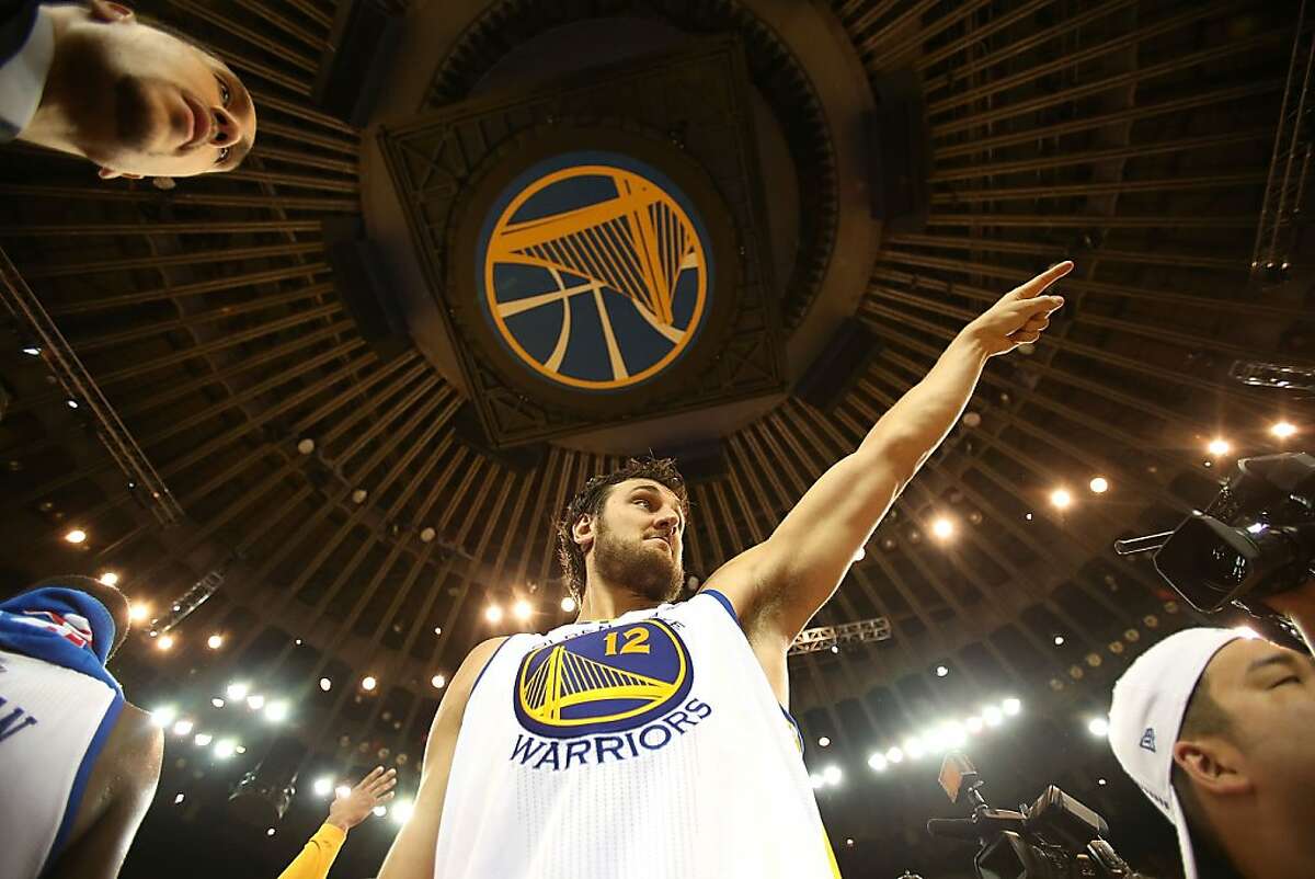 OAKLAND, CA - MAY 02: Andrew Bogut #12 of the Golden State Warriors celebrates after defeating the Denver Nuggets during Game Six of the Western Conference Quarterfinals of the 2013 NBA Playoffs at ORACLE Arena on May 2, 2013 in Oakland, California. NOTE TO USER: User expressly acknowledges and agrees that, by downloading and or using this photograph, User is consenting to the terms and conditions of the Getty Images License Agreement. (Photo by Jed Jacobsohn/Getty Images)