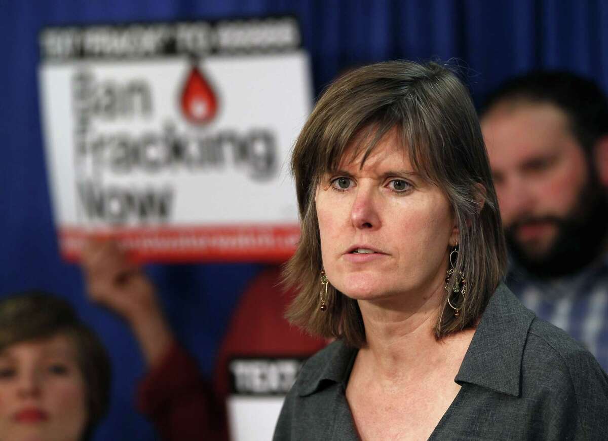 FILE - In this March 26, 2012 file photo, author Sandra Steingraber speaks during a New Yorkers Against Fracking news conference in Albany, N.Y. Steingraber, who is at the forefront of the anti-fracking movement in New York, was jailed for blocking access to a gas storage project in the Finger Lakes. (AP Photo/Mike Groll, File)