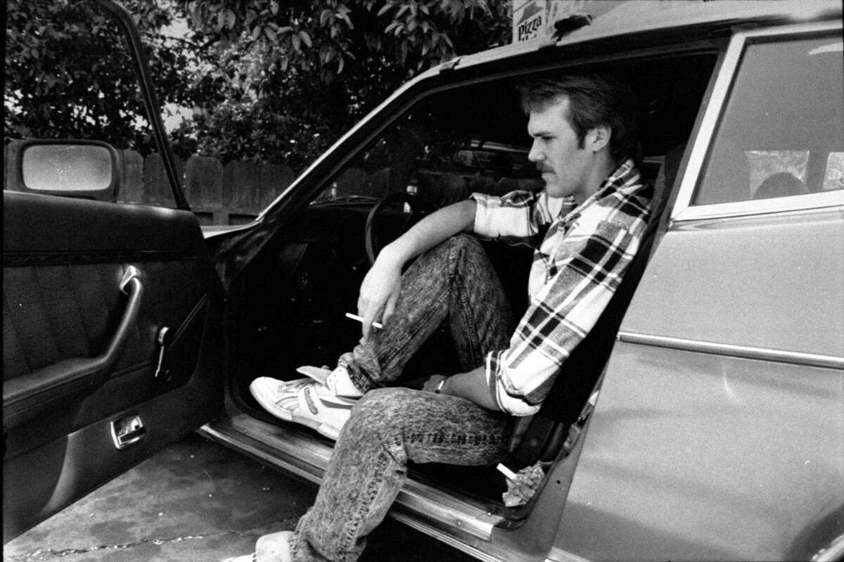 Child kidnap victim Steven Stayner,  23, is seen smoking a cigarette inside a car about a year before his death.