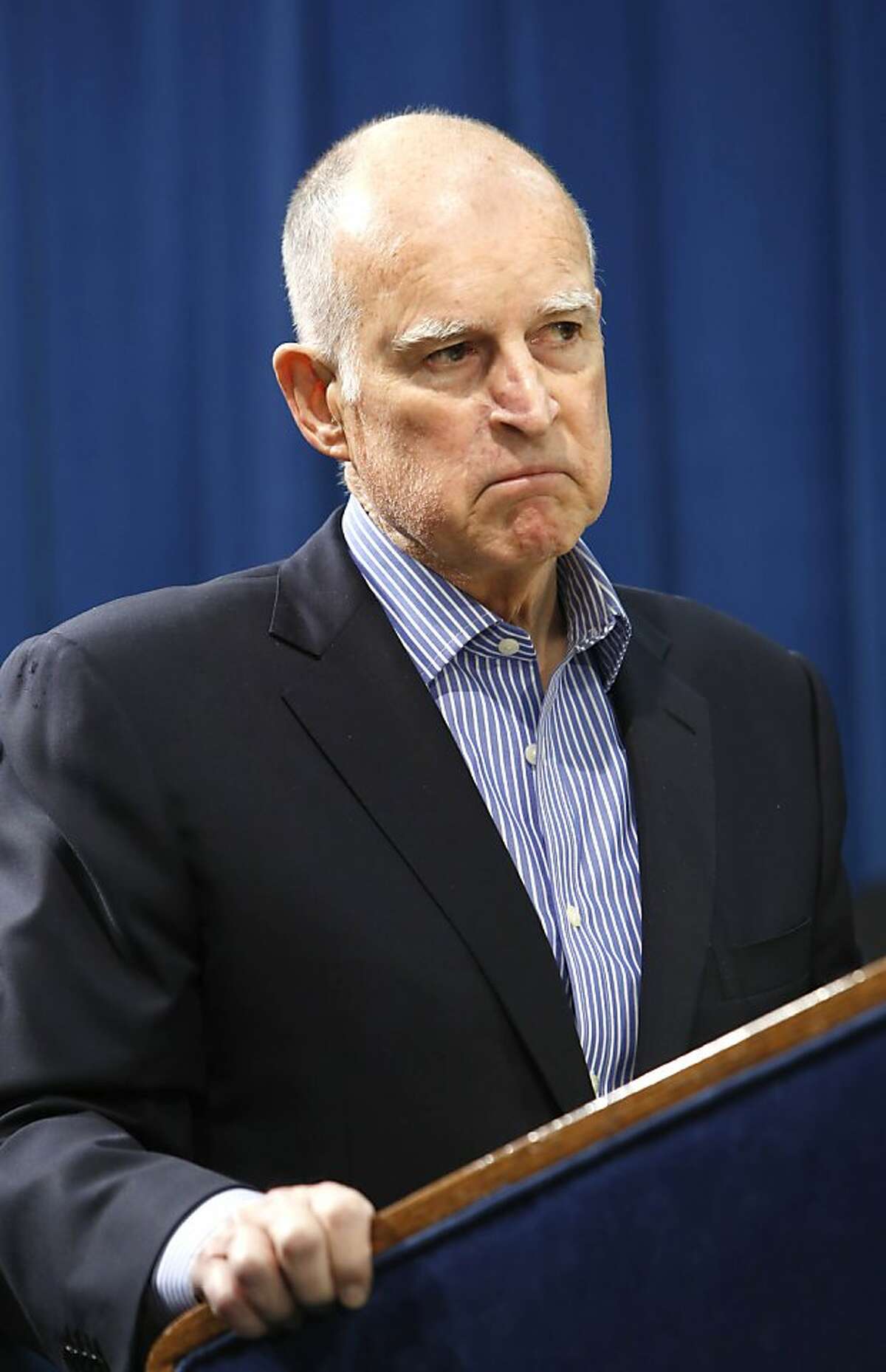 Gov. Jerry Brown ponders a questions concerning the education spending reforms included in his proposed state budget during a Capitol news conference in Sacramento, Calif., Wednesday, April 24, 2013. Brown met with a group of local school superintendents from throughout the state abut his plan to give local schools more controls of the money they receive from the state and give poorer school districts a disproportionately large share of state aid. (AP Photo/Rich Pedroncelli)
