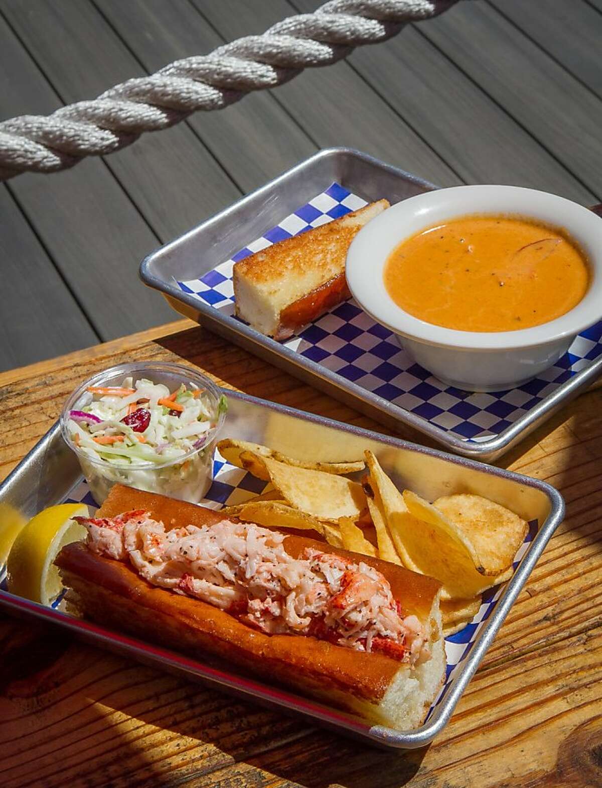 The Lobster roll with a bowl of Clam Chowder at the New England Lobster Company in Burlingame, Calif., is seen on Tuesday, April 30th, 2012.