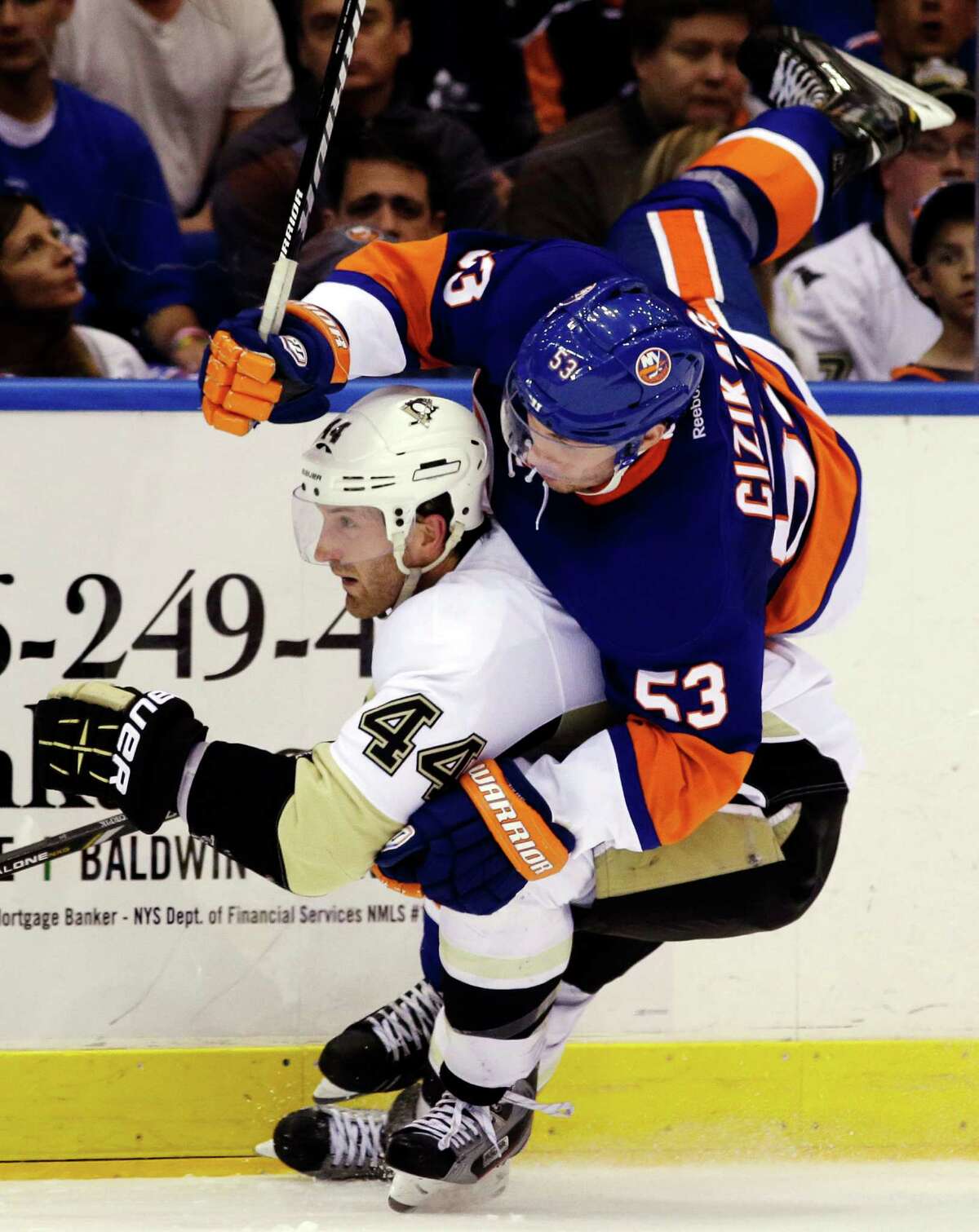 The Penguins and Islanders played a thriller that also included a spill of Casey Cizikas by Brooks Orpik.