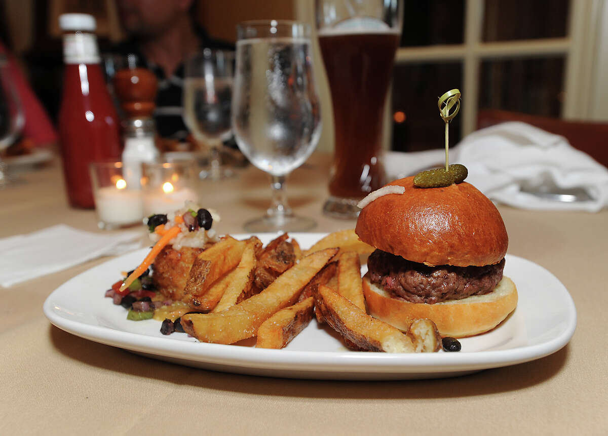 A slider, crab cake and home-made fries were on the menu at the Ginger Man restaurant in Greenwich, Wednesday, May 8, 2013, during the Dishcrawl event. Dishcrawl is a restaurant tour business.