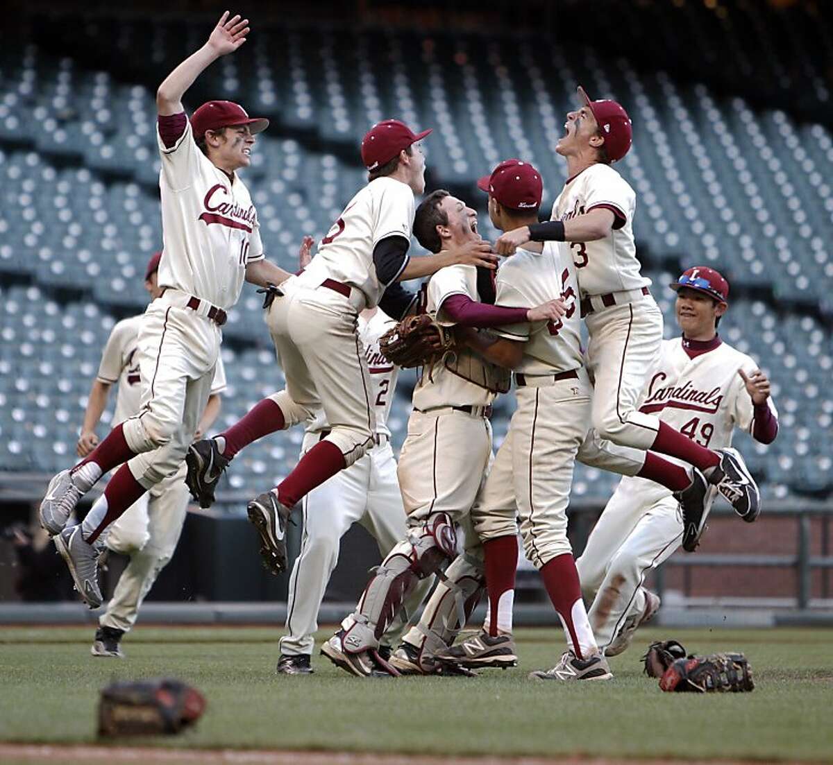 The Lowell Cardinals rush the field after they defeated the Washington Eagles on Wednesday. The Lowell High School Cardinals played the Washington High School Eagles in the San Francisco CIF Spring Championships at AT&T Park in San Francisco, Calif,. on Wednesday, May 8, 2013.