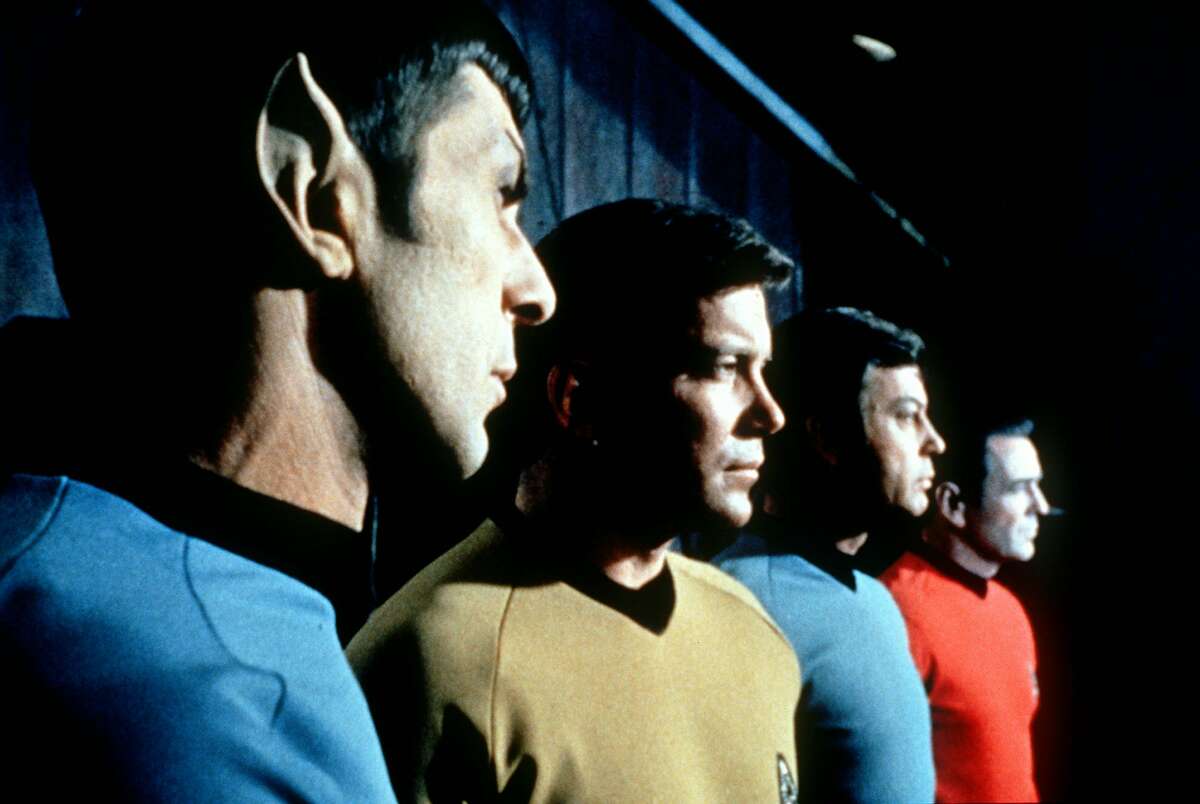 Leonard Nemoy as Spock, William Shatner as  Kirk, DeForest Kelley as McCoy and James Doohan as Scotty.