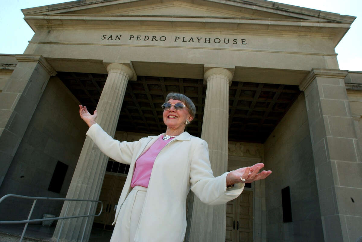 Mary Denman, an icon in the broadcasting industry, shown June 9, 2002, in front of the San Pedro Playhouse. Her board service at San Pedro Playhouse spanned many years. She also chaired the capital campaign committee which renovated and restored the 70-plus year old Playhouse.