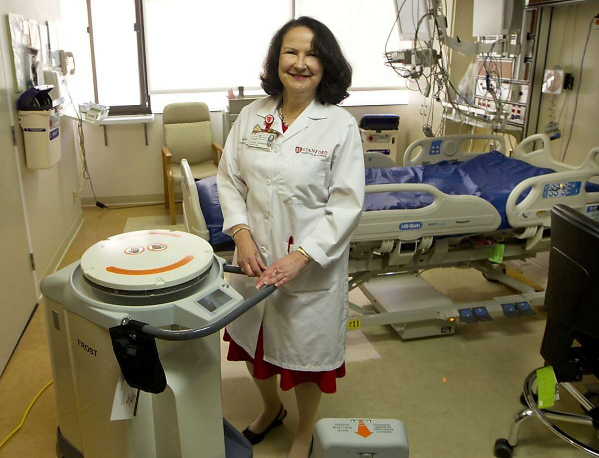 Sasha Madison R.N. Manager infection Control with the Xenex machine at the Stanford Hospital and Clinics on Monday, April 29, 2013. ( Norbert von der Groeben / Stanford Hospital and Clinics )