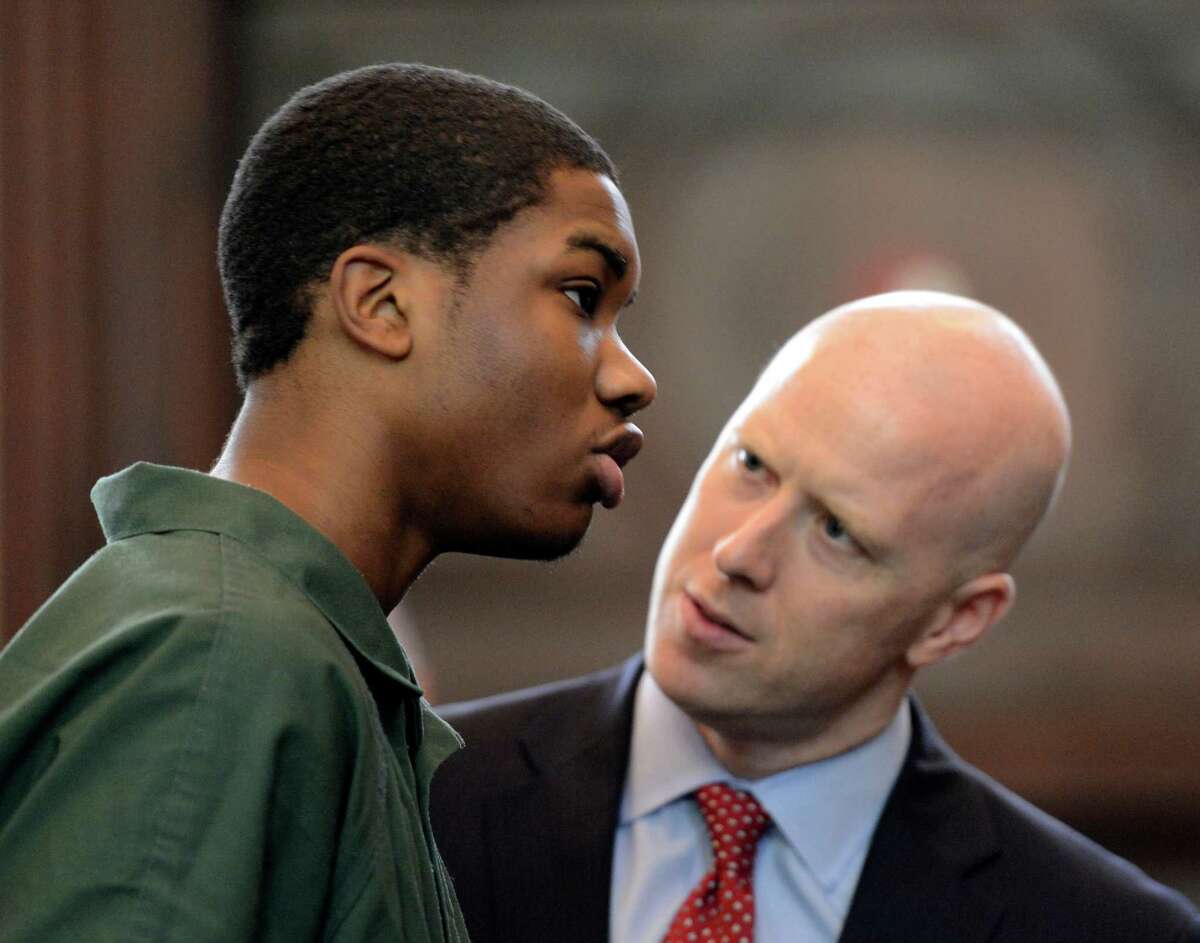 Keith Ferguson, left, with his attorney Lee Kindlon, takes a plea deal in front of Judge Patrick McGrath May 10, 2013 at the Rensselaer County Courthouse in Troy, N.Y. and received 10 years in state prison for robbery (Skip Dickstein/Times Union)