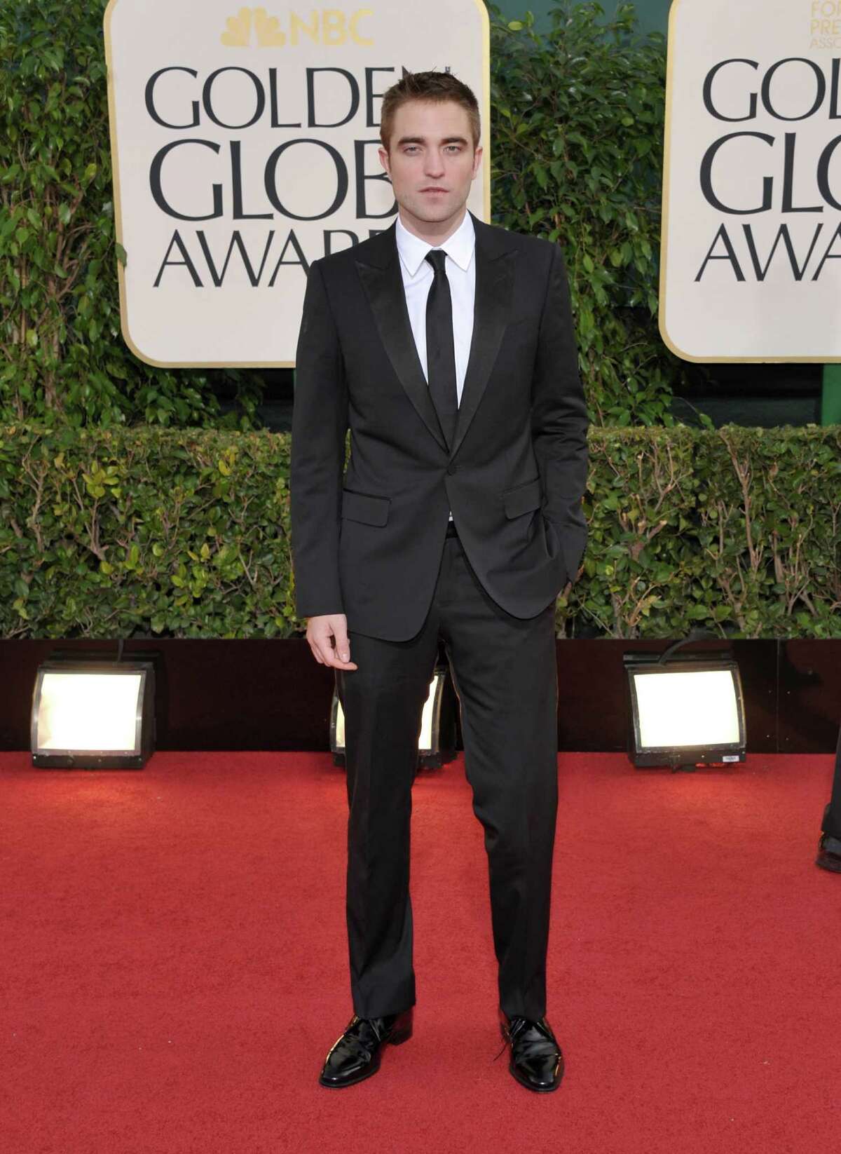 Actor Robert Pattinson arrives at the 70th Annual Golden Globe Awards at the Beverly Hilton Hotel on Sunday Jan. 13, 2013, in Beverly Hills, Calif. (Photo by John Shearer/Invision/AP)