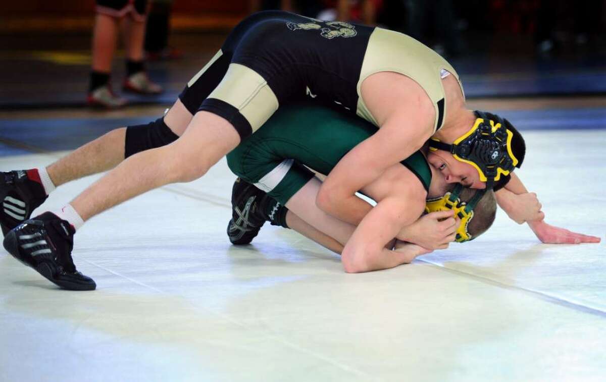 Saturday's roundup: Warde wrestlers pin down title in own invitational