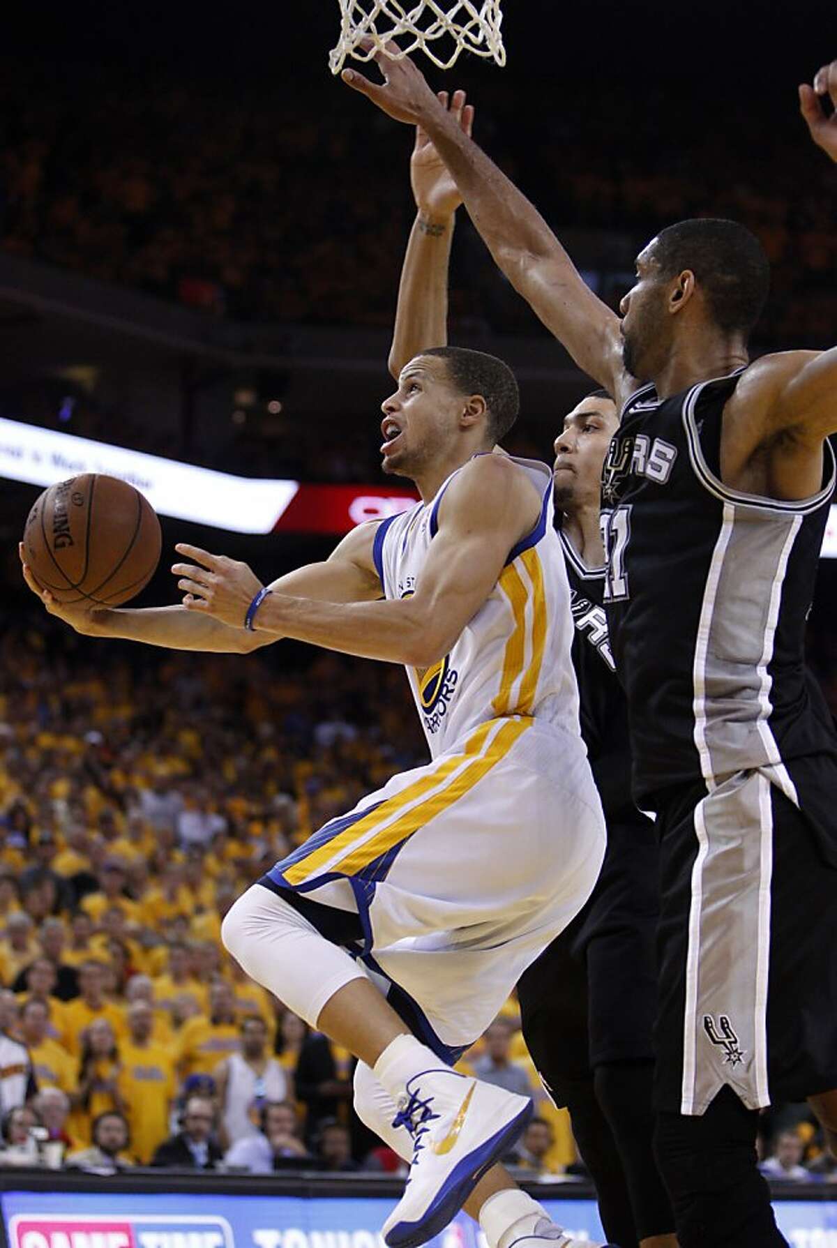 Warriors beat Spurs in OT, even series