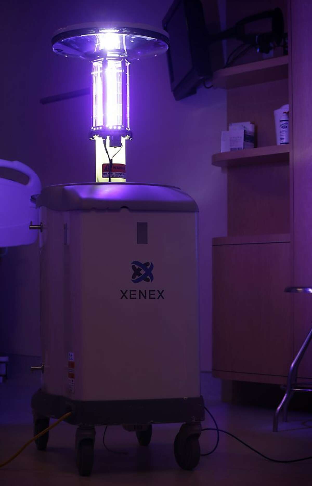 Using ultraviolet light, a machine disinfects a hospital room at the Westchester Medical Center in Valhalla, N.Y., Wednesday, March 20, 2013. (AP Photo/Seth Wenig)