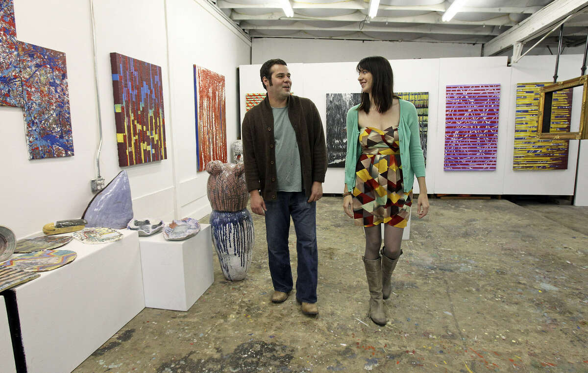 Alex and Ann Marie Comminos talk as they show their gallery in the Lone Star Art District earlier this year.