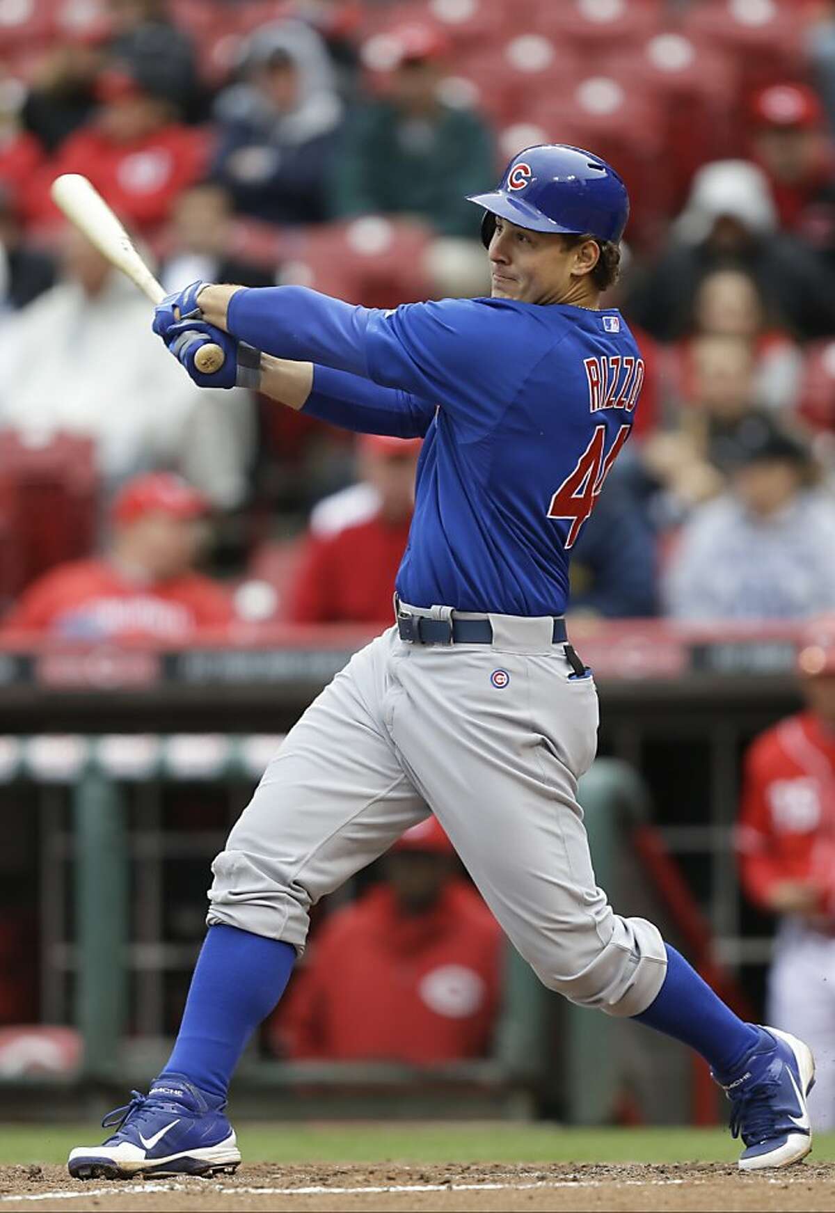 Chicago Cubs' Anthony Rizzo bats against the Cincinnati Reds in a baseball game, Wednesday, April 24, 2013, in Cincinnati. (AP Photo/Al Behrman)