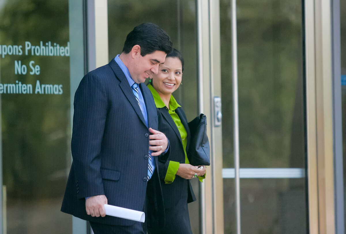 Ex-Cameron County DA Armando Villalobos and his wife Yolanda walk out of the federal courthouse in Brownsville during his trial on extortion and racketeering charges.
