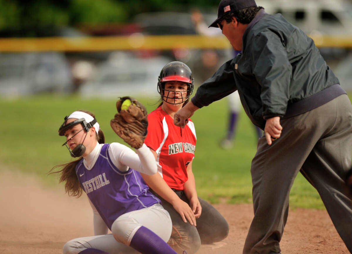 New Canaan's Amanda Frattaroli reacts to being tagged out as second by Westhill shortstop Morgan Kurtz during their game at Westhill High School on Tuesday, May 14, 2013. Westhill won, 4-3.
