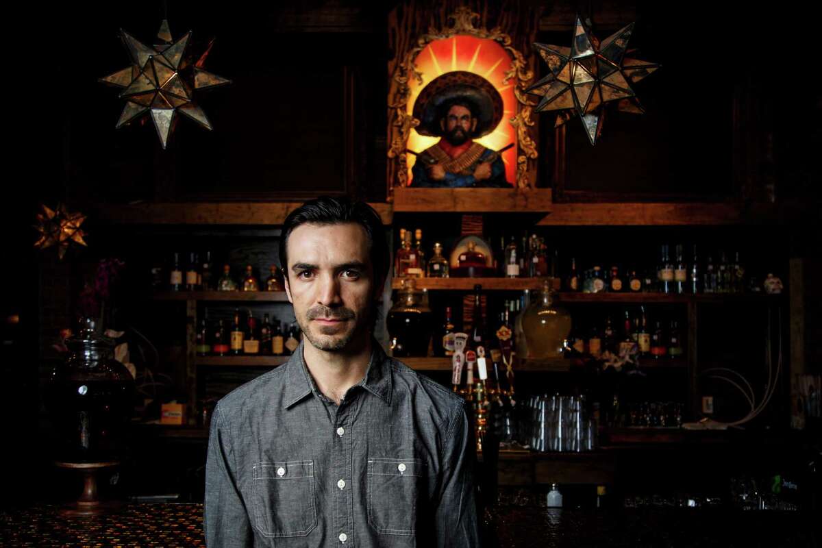 Shawn Bermudez poses for a photo inside his new tequila and taco bar, "Pistolero's", Wednesday, May 8, 2013, in Houston. Bermudez owns Royal Oak, Boondocks and several other businesses along the Westheimer curve. ( Michael Paulsen / Houston Chronicle )