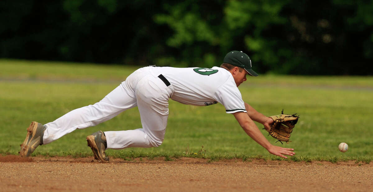 Norwalk second baseman David Balunek dives to keep the ball in the infield during the Bears' game against Stamford at Eric Malmquist Field in Norwalk on Wednesday, May 15, 2013. Stamford won, 7-2.