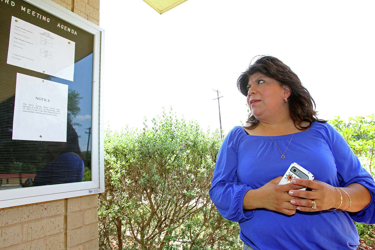 Patricia Cortez looks at the results as Lytle ISD District 1 returns only one vote for a school board seat in recent elections. May 14, 2013.