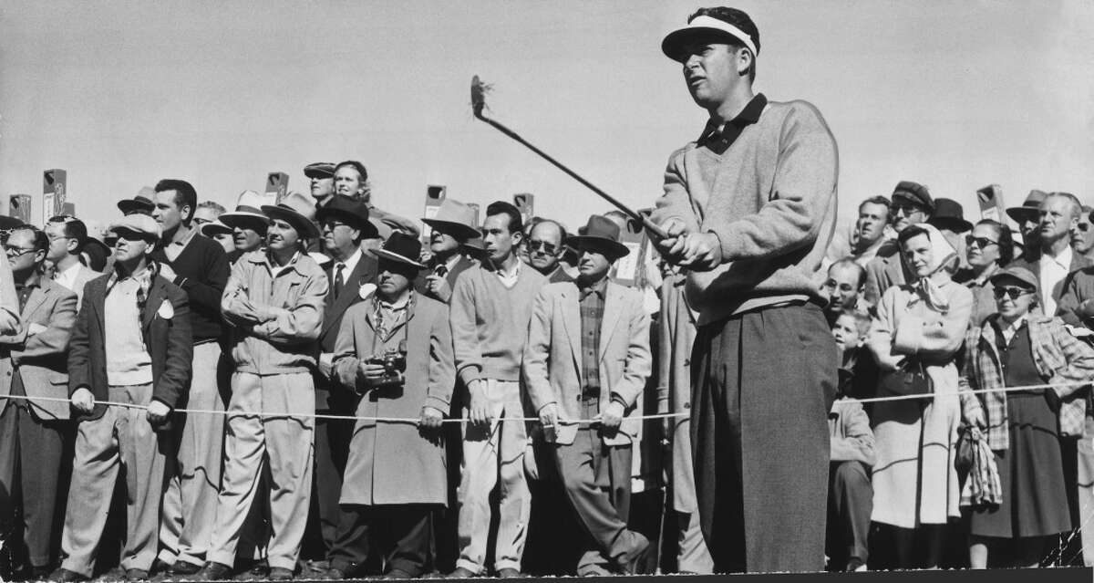 A determined Ken Venturi is surrounded by a straining gallery, on his way to victory in the 1956 California State Amateur Championship. After turning pro, he won 14 events on the PGA Tour.
