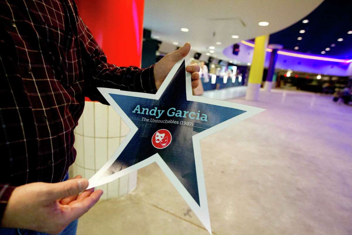 Art Seago of Viva Cinema holds a sample of a star that will be placed on the floor with other Hollywood names in the theater, focusing on the Latino audience.