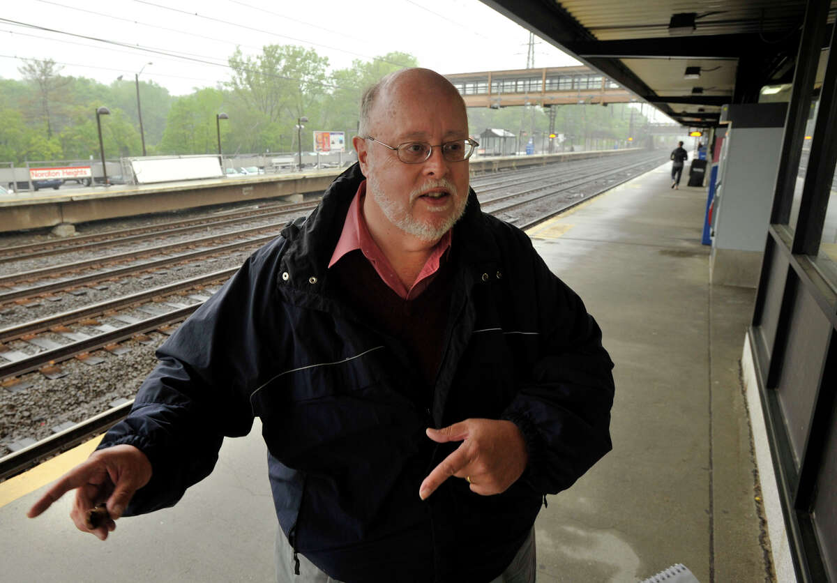 Jim Cameron talks to a reporter at the Noroton Heights train station in Darien on Sunday, May 19, 2013. Cameron is the chairman of the Connecticut Rail Commuter Council.
