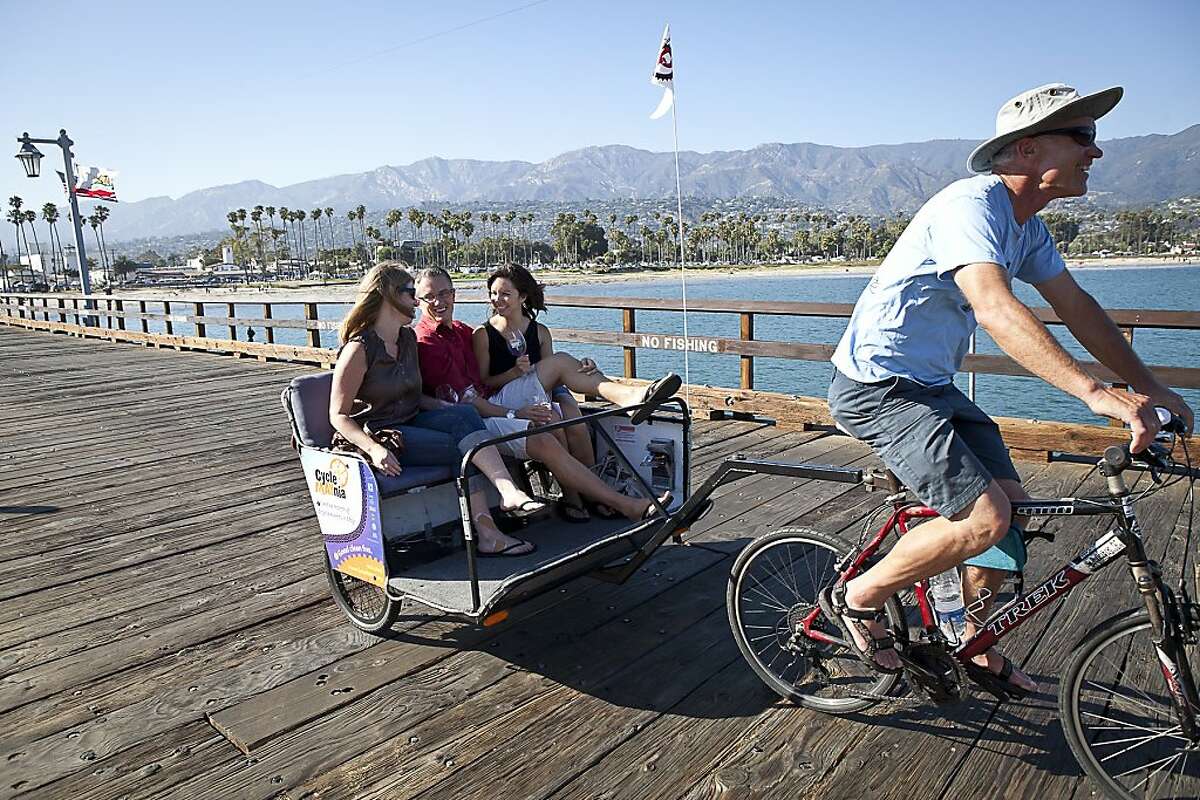 A pedicab ferries customers at Stearns Wharf in Santa Barbara. Credit: Matt Dayka/Santa Barbara Conference & Visitors Bureau and Film Commission