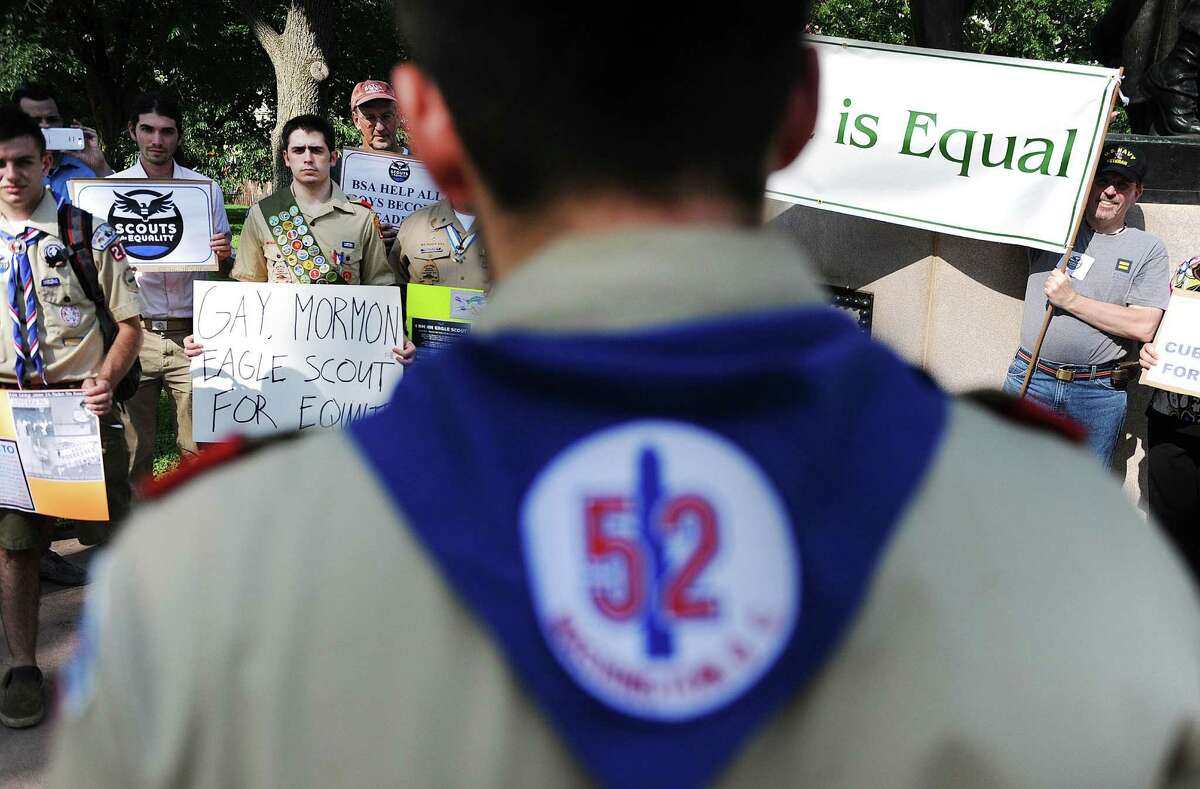 Scouts for Equality members hold a rally to call for equality and inclusion for gays in the Boy Scouts of America at the Boy Scout Memorial in Washington.