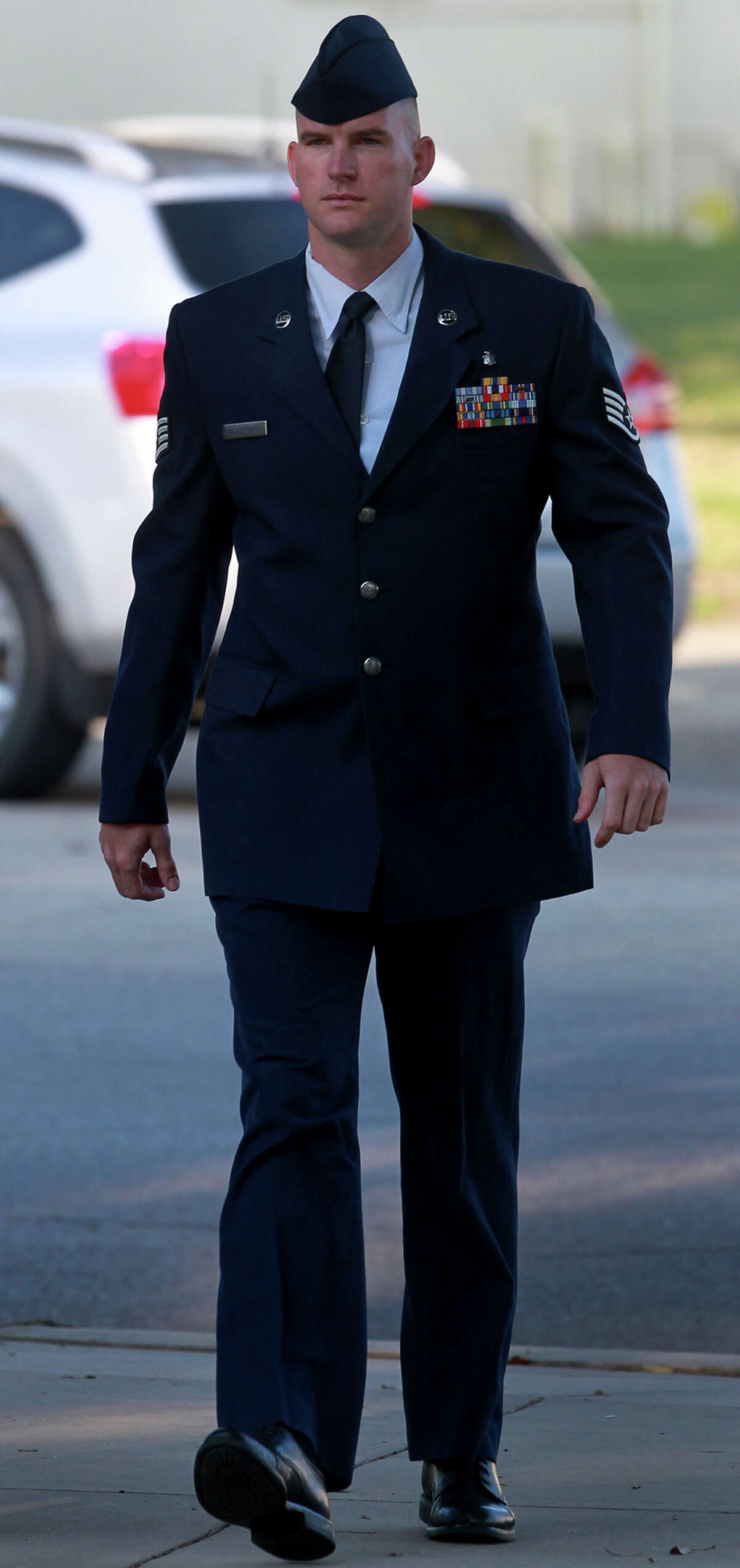Basic training instructor Michael Wladischkin walks to a hearing at Joint Base San Antonio-Randolph Wednesday May 22, 2013. Wladischkin faces an Article 32 evidentiary hearing on allegations of indecent acts, adultery, and unprofessional relationships with technical training students.