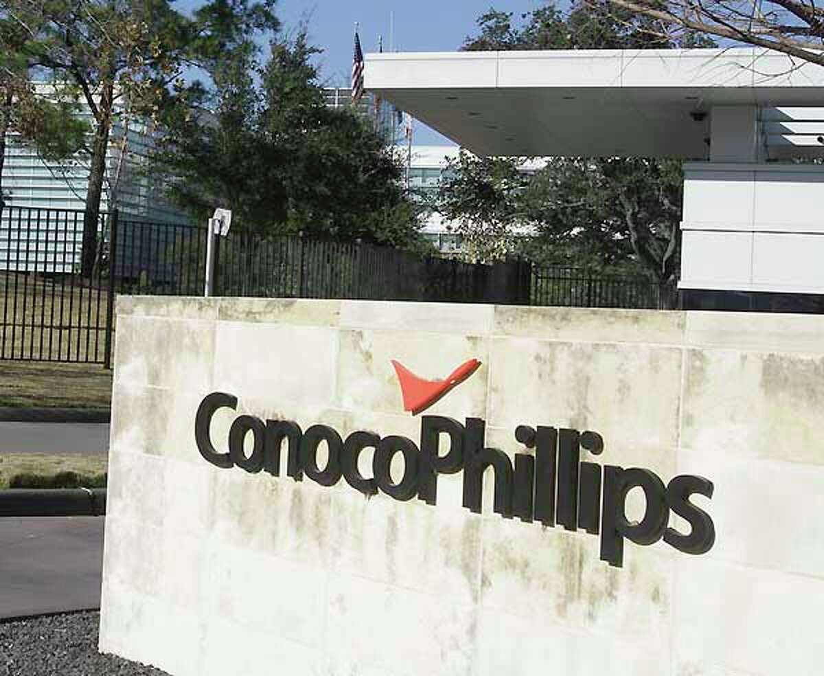 A sign is displayed outside the ConocoPhillips corporate headquarters in Houston.