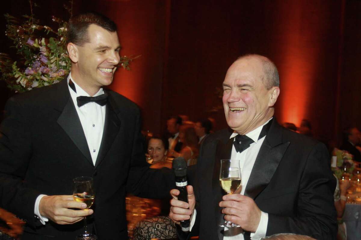 Mark Hanson, left, with Hans Graf, the symphony's departing music director