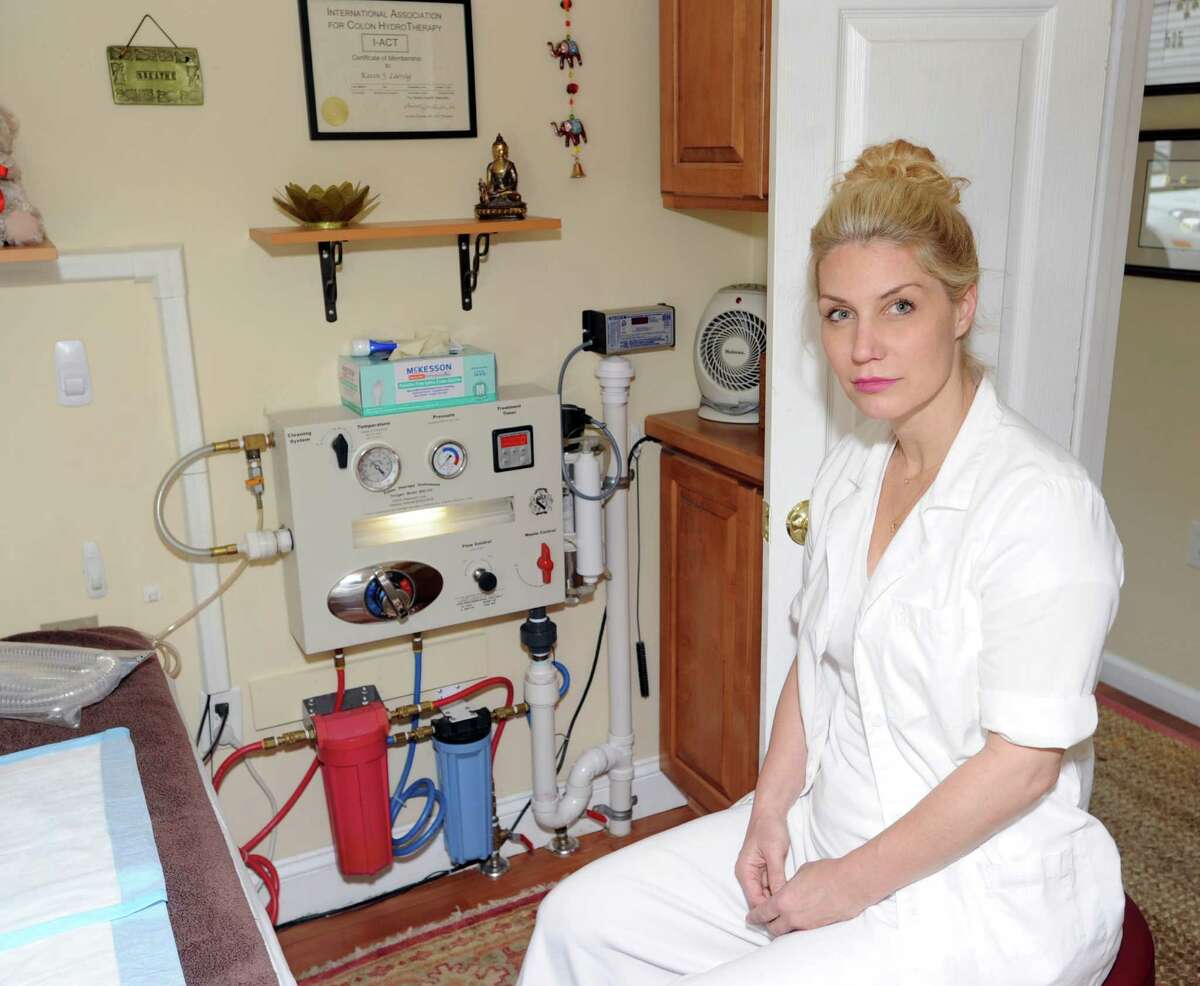 Karen Laessig, the owner and operator of Alaya Wellness Center, a colon hydrotherapy clinic, at her place of business in Cos Cob, Friday, May 24, 2013. The town is seeking to close Laessig's business. The town's position is that only licensed medical professionals should perform colonics. Laessig is seeking relief from the General Assembly, which is considering a pair of bills that would create a list of certified colon-cleansing clinics in the state.