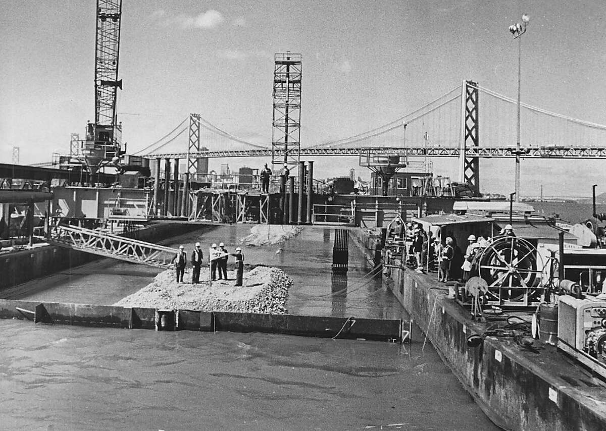 03_12_09_0931.JPG April 4, 1969- Lowering last trans bay tube. BART construction Officials: Gordon C. Luce, Arnold Anderson, B.R. Stokes, L.G. Waigano, John Buehler. Art Frisch /San Francisco Chronicle