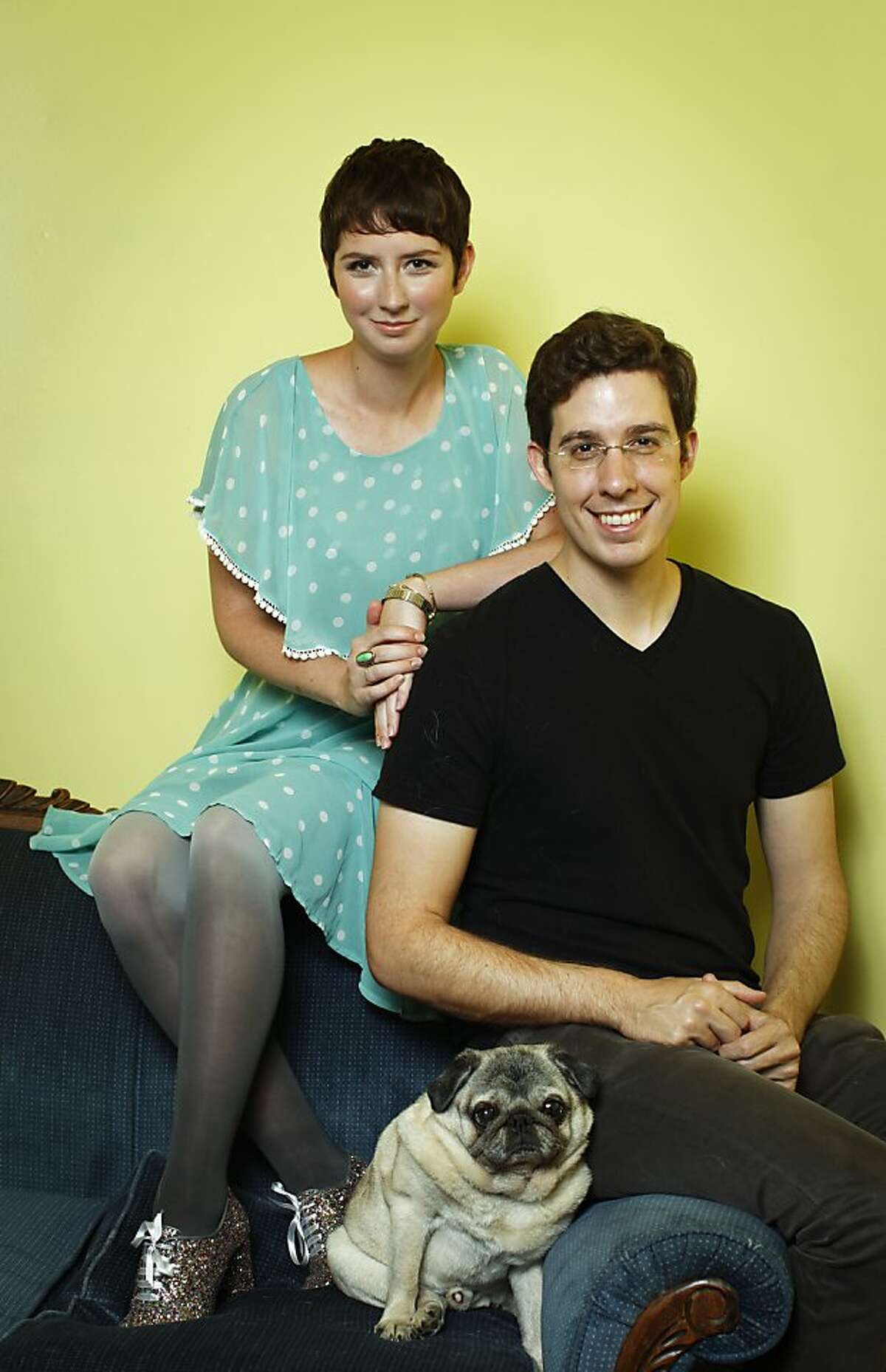 Susan and Eric Koger, founders of Modcloth, are seen with their dog, Winston, in their San Francisco, Calif., office on Tuesday, May 14, 2013.