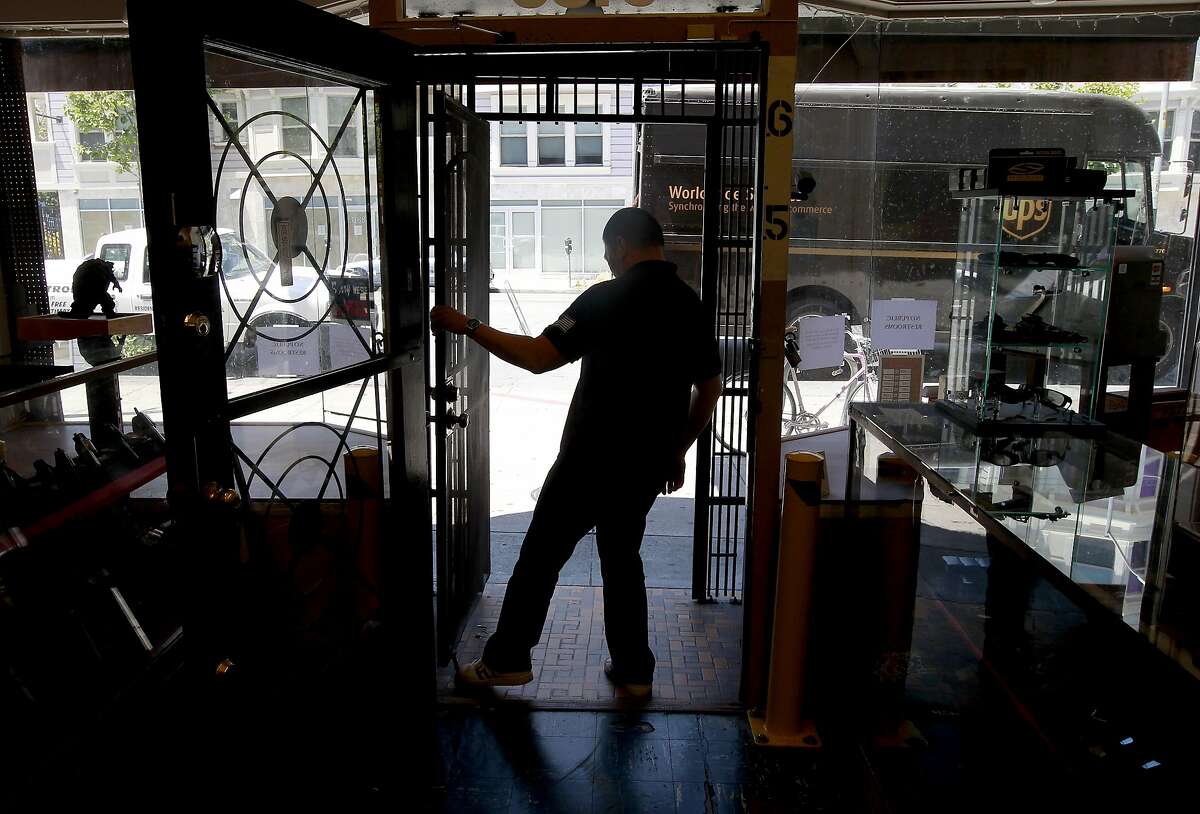 UPS arrives with the twice weekly deliveries as General Manager Steven Alcairo opens his doors at High Bridge Arms in San Francisco, Calif. on Thurs. May 23, 2013 and will be distributed in the next few days. High Bridge Arms the last gun shop in San Francisco has been having trouble acquiring ammunition since the first of this year. General manager Steven Alcairo says that their twice a week ammunition orders are at one quarter of what they used to get due to availability.