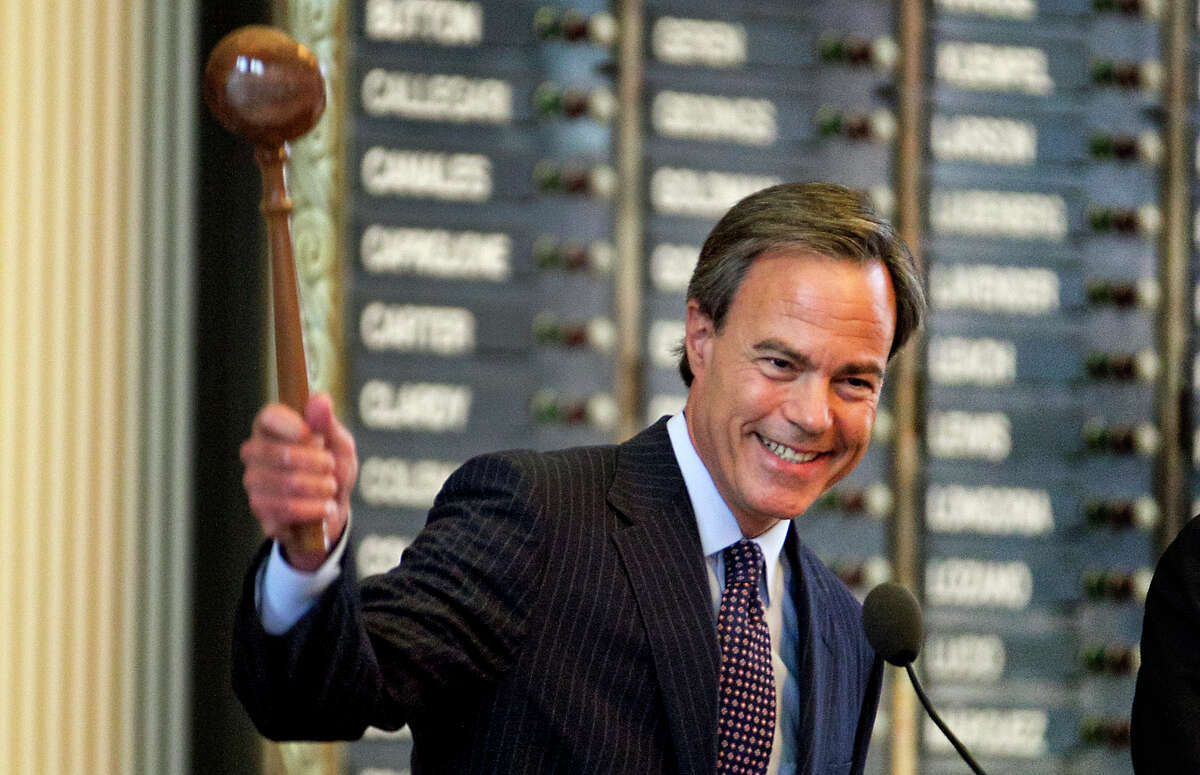 Speaker of the House Joe Straus, R-San Antonio, smiles as he bangs the gavel closing Sine Die on the 83rd Legislator held at the State Capitol on Monday, May 27, 2013, in Austin, Texas. Soon after the closing of the 83rd Legislator Governor Rick Perry called for a special session to begin immediately to consider redistricting. (AP Photo/Austin American-Statesman, Rodolfo Gonzalez)