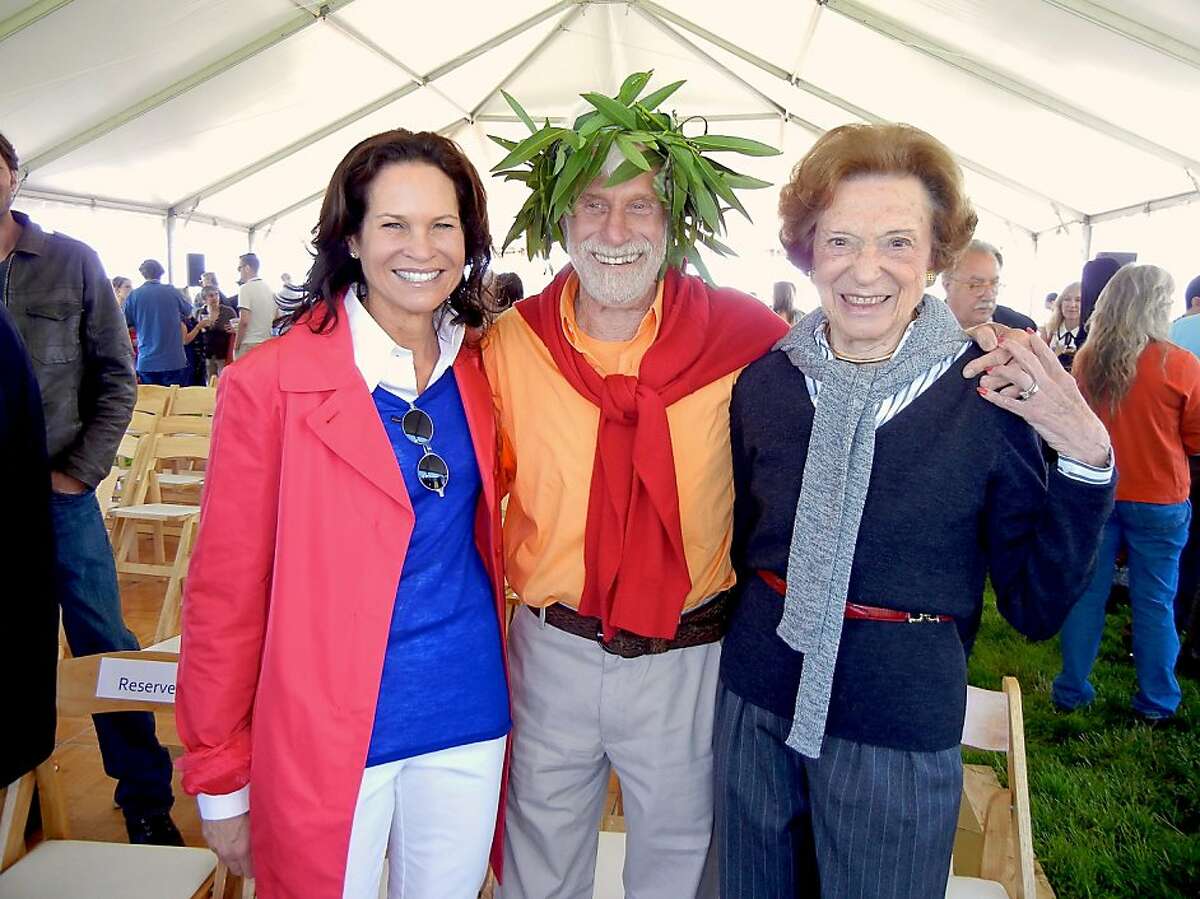 Randi Fisher (at left) with artist Mark di Suvero and her mother-in-law, Doris Fisher, at Crissy Field for SFMOMA's preview of the artist's sculptures. May 2013. By Catherine Bigelow.