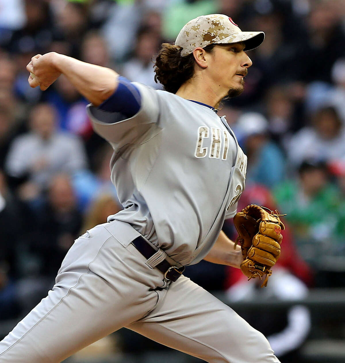 Cubs starter Jeff Samardzija, delivering in the first inning, tossed a two-hit shutout Monday.
