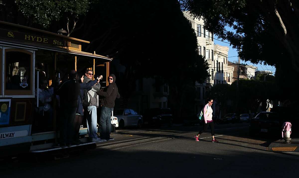 A cable car passes Green Street on Hyde Street on May 23, 2013 in the Russian Hill area of San Francisco, Calif.