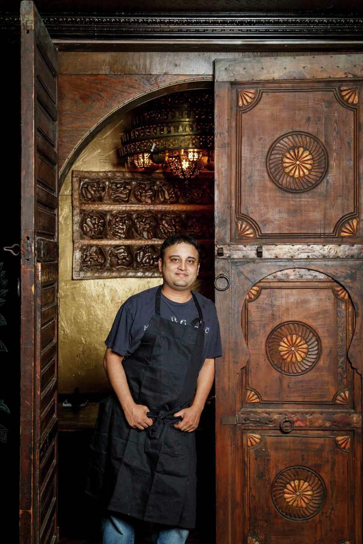 Chef and owner Rikesh Patel at his restaurant Ambrosia which features an Asian fusion cuisines merging Japanese, Thai, Vietnamese and Chinese flavors, Thursday, May 23, 2013, in Houston. ( Michael Paulsen / Houston Chronicle )