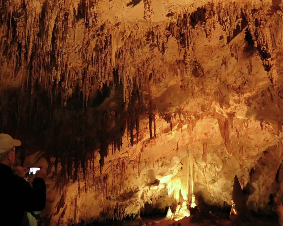 Delicate formations called soda straws cover the ceiling of the Papoose Room in the Kings Palace section of Carlsbad Caverns, first explored by a cowboy in 1898.