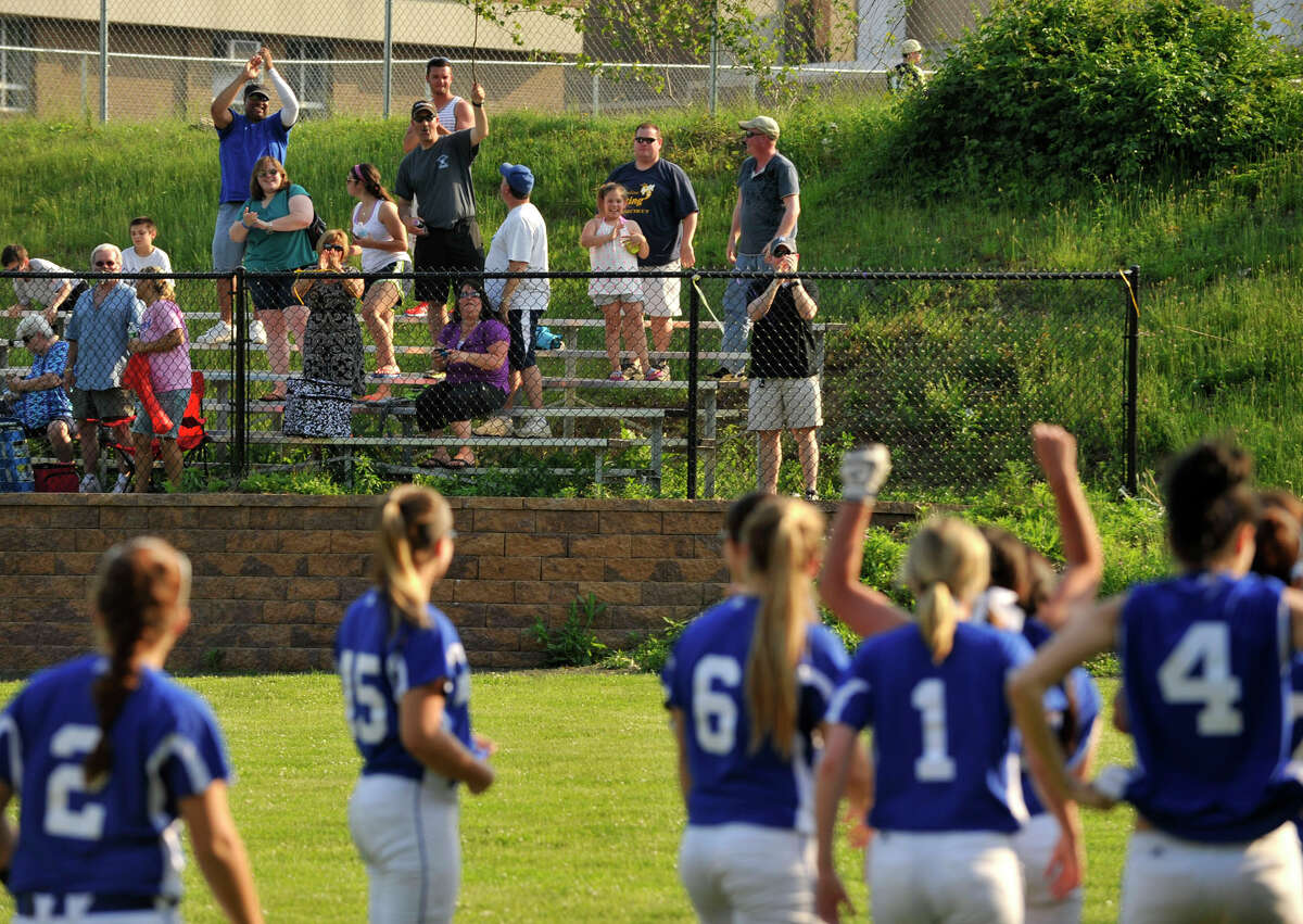 West Haven fans cheer on their team after they beat Westhill, 5-0, in the second round game of the Class LL state softball championship at Westhill High School in Stamford on Thursday, May 30, 2013.