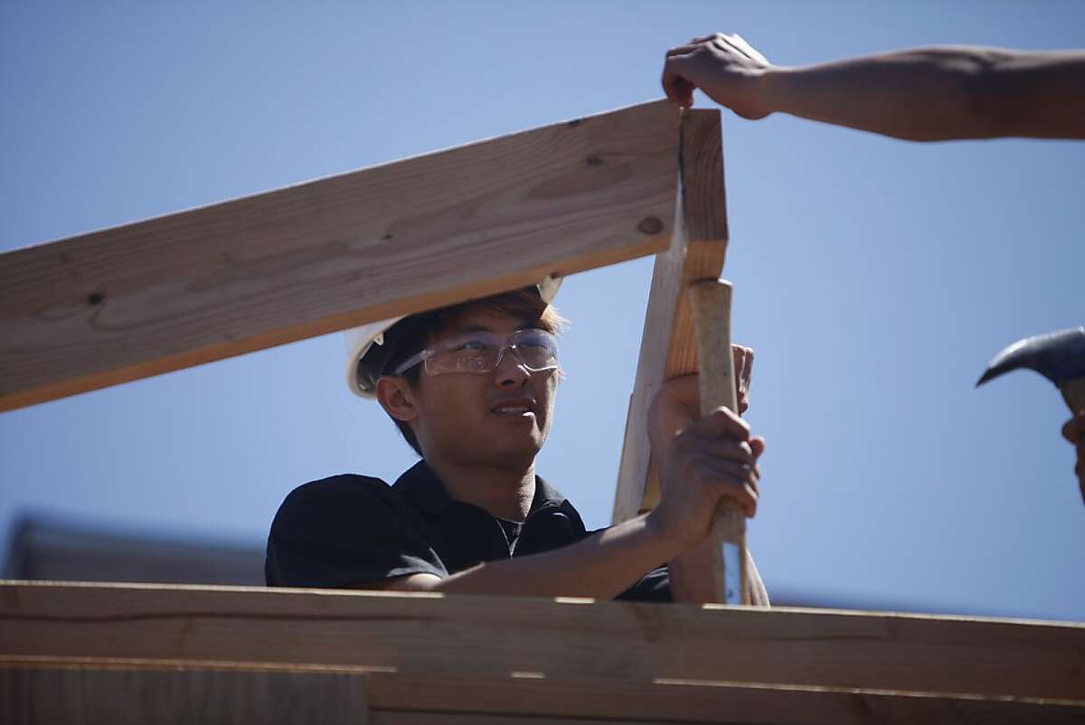 Barry Wu works on framing during a class with CityBuild Academy at the City College of San Francisco Evans Campus on Monday, April 15, 2013 in San Francisco, Calif.