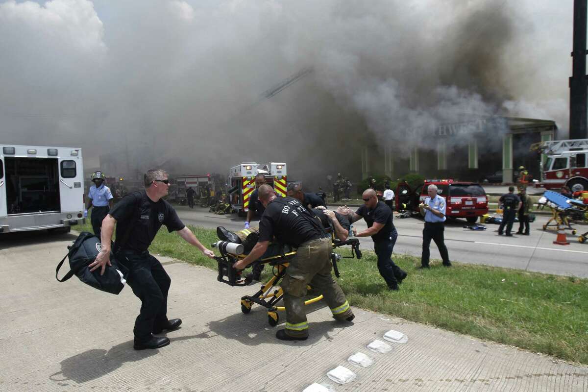 Smoke blanketed U.S. 59 after a 4-alarm fire Friday afternoon.