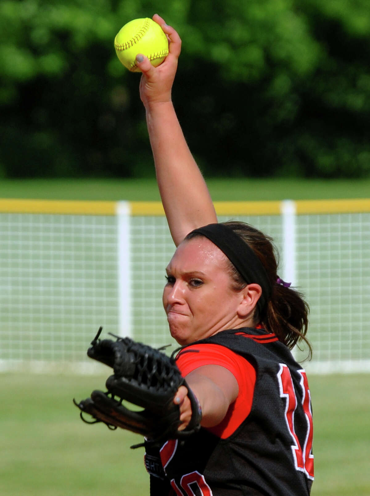 Masuk's Tatum Buckley delivers a pitch during Class L Quarterfinal softball action against Fitch in Monroe, Conn. on Friday May 31, 2013.