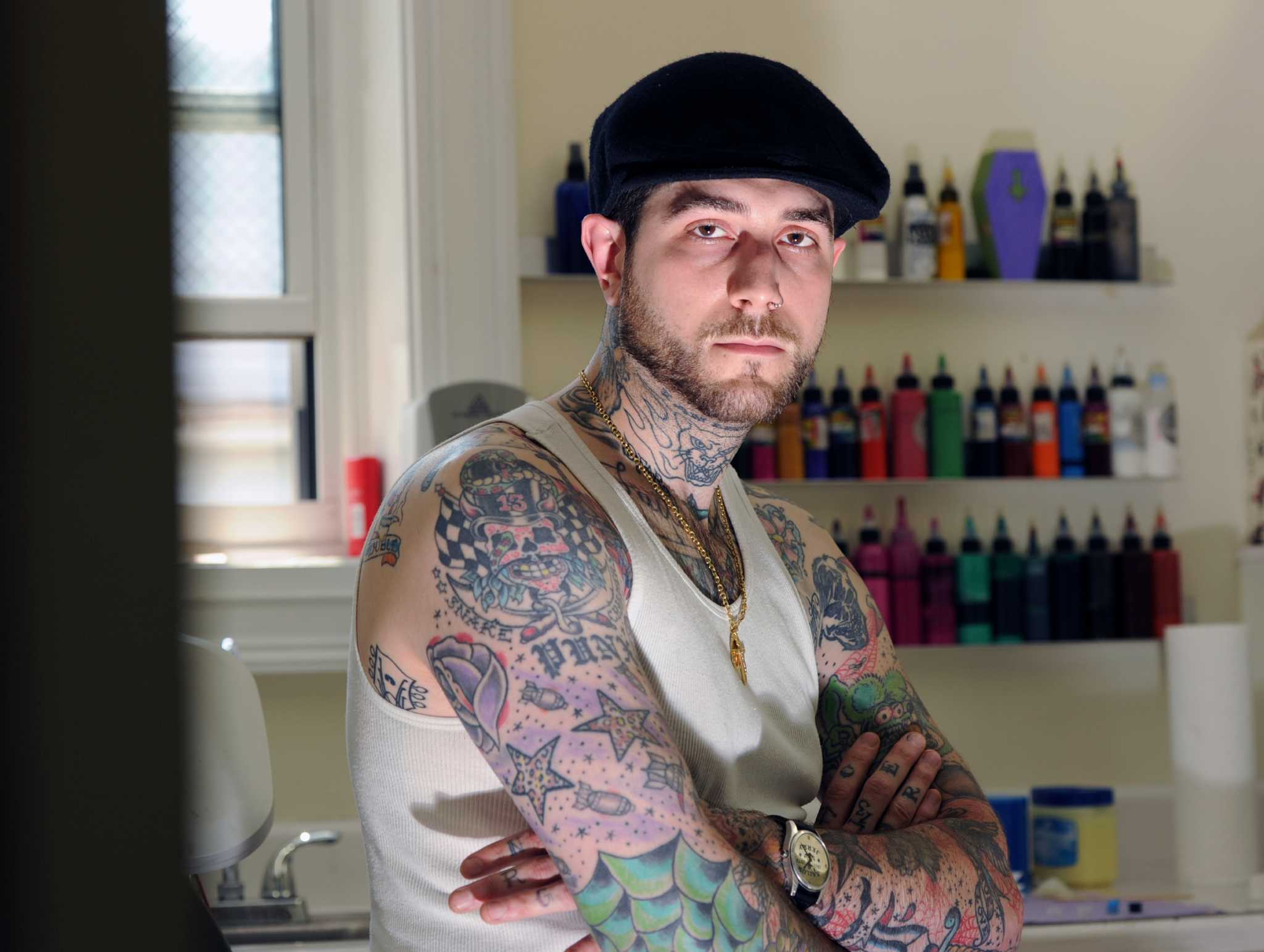 State considers licensing tattoo artists