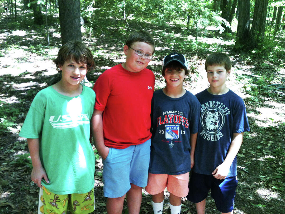 Southport Park was a hit with kids Saturday when its official opening took place. Among those exploring the trails were, from left, Mac Forehand, George Wyckoff, Kyle Stevenson and Quinn Pavoz. FAIRFIELD CITIZEN, CT 6/1/13